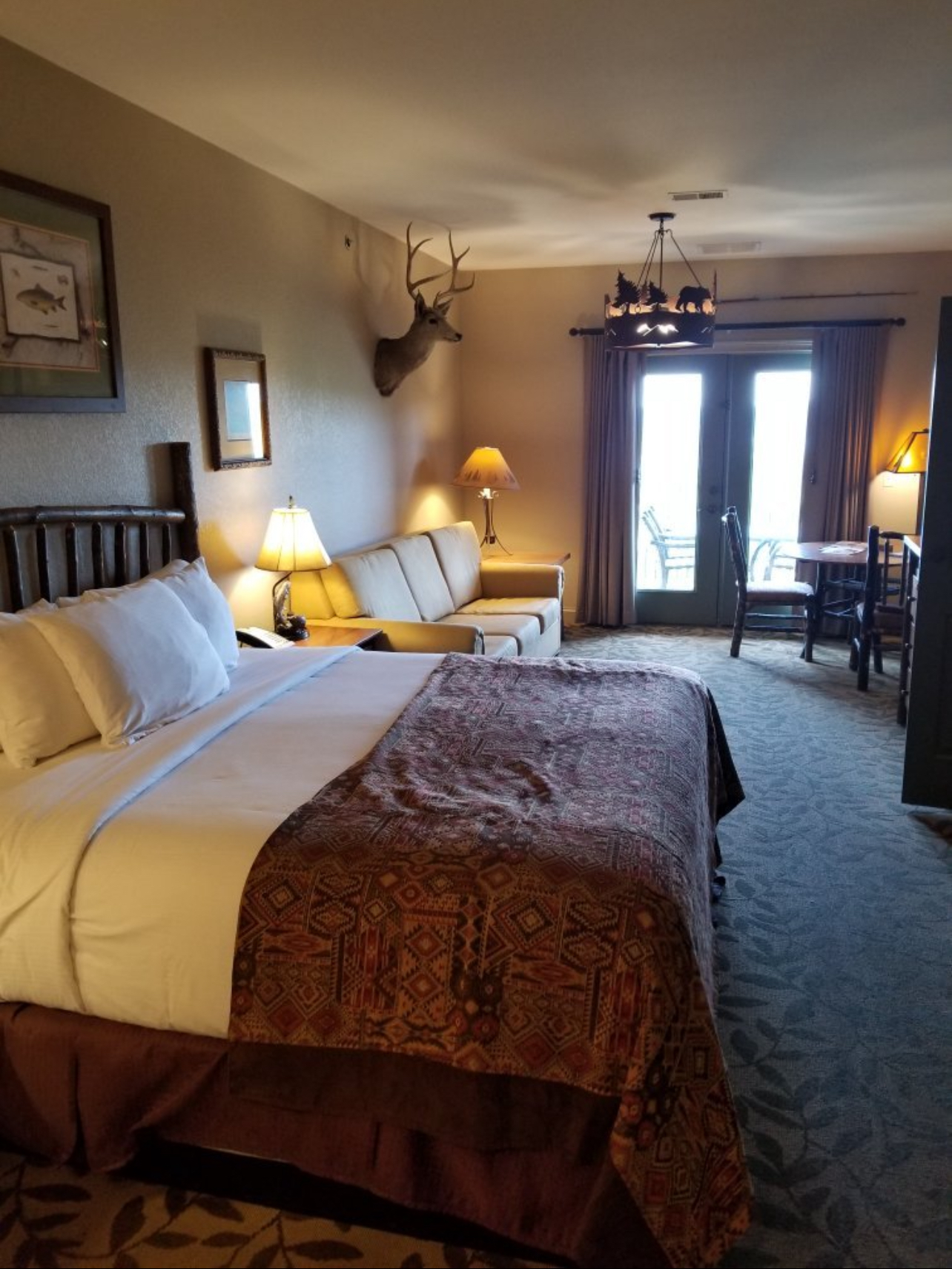 A Suite — Premium room with separate living area, king bed, and luxury bathroom. Highest standard placement requirements.